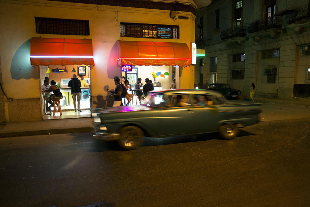 Local cafe and old car