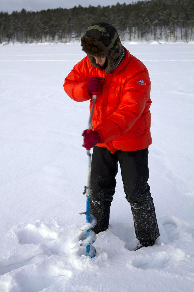 Drilling a hole in the 30cm thick ice