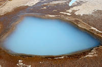 Some crazy silica/algae spring, that ends up looking like glowing anti-freeze.  This is what Blue Lagoon looks like.